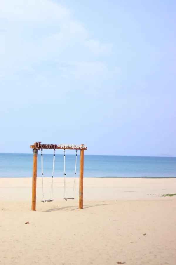 Rayong beach with wooden swing