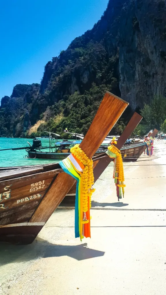 Koh Samui beach with long-tail boats